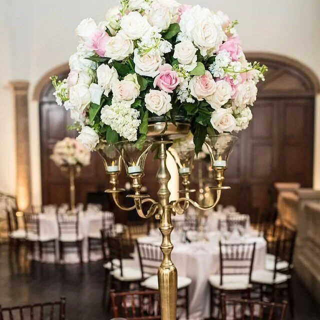 Table with centerpiece during a wedding. Houston Ballroom - Houston, TX - The Bell Tower on 34th